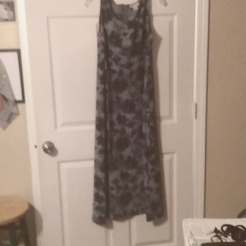 Long green flowing type dress. Ties in the back .